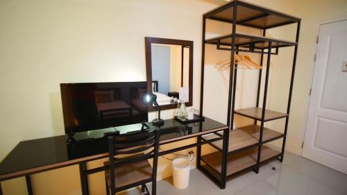 Μια τηλεόραση ή/και κέντρο ψυχαγωγίας στο Salin Home Hotel Ramkhamhaeng