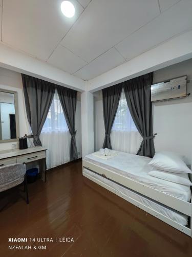Postel nebo postele na pokoji v ubytování Chalet Kurung Tengar