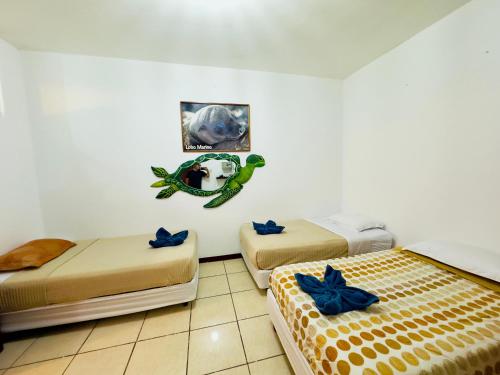 Ένα ή περισσότερα κρεβάτια σε δωμάτιο στο Tintorera Guest House