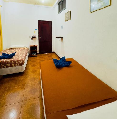 Ένα ή περισσότερα κρεβάτια σε δωμάτιο στο Tintorera Guest House