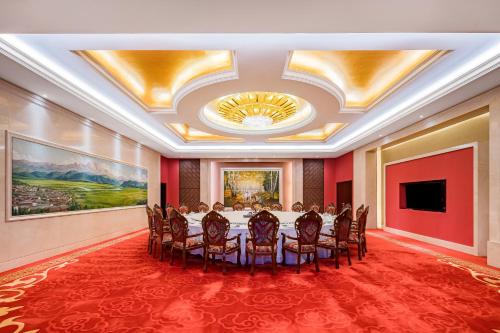 TV a/nebo společenská místnost v ubytování Langfang Arcadia International Hotel