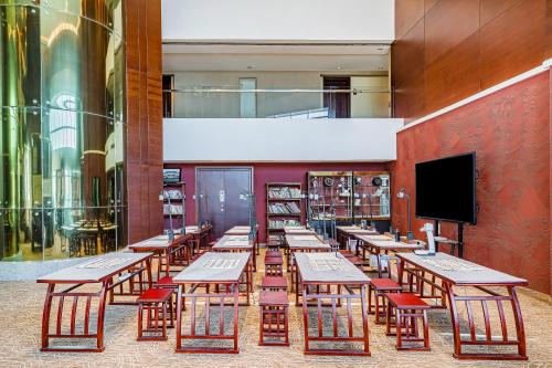 TV a/nebo společenská místnost v ubytování Langfang Arcadia International Hotel