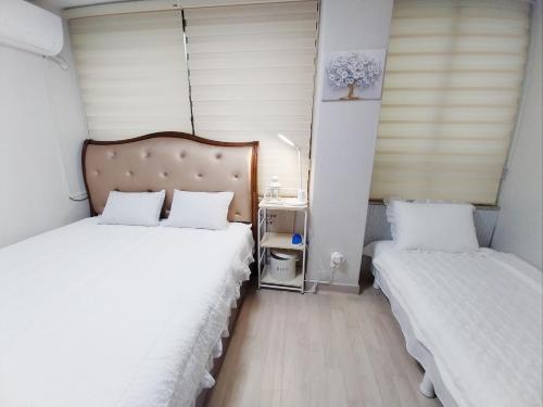 Daegu Room new open 4 RoomPrivate Villaにあるベッド