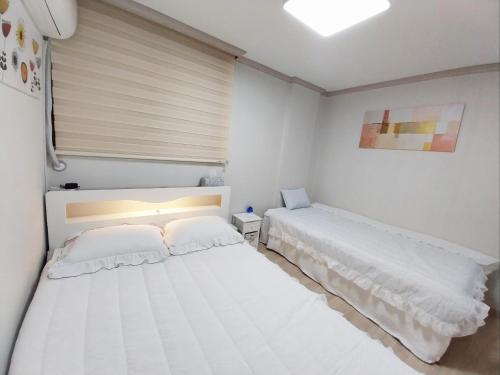 Daegu Room new open 4 RoomPrivate Villaにあるベッド