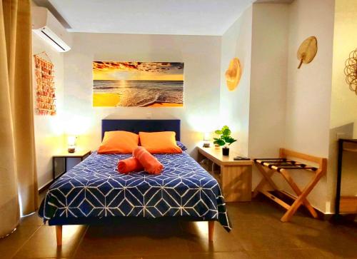 Llit o llits en una habitació de Teahupo'o Lodge Tahiti - Studio Natura - climatisé - entre mer et montagne - paddle et canoe offerts