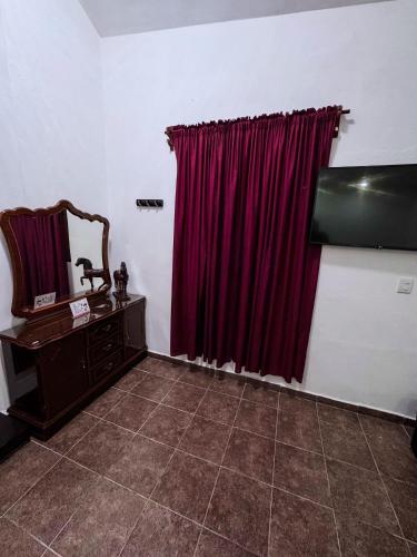 Μια τηλεόραση ή/και κέντρο ψυχαγωγίας στο Hotel CALLI YOLOTL Teotihuacan