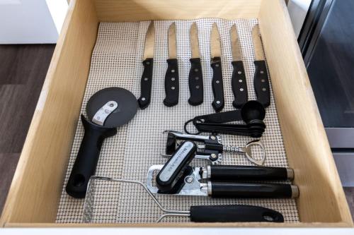 a box filled with cooking utensils and other kitchen items at Peaceful Modern Home near Avon in Avon