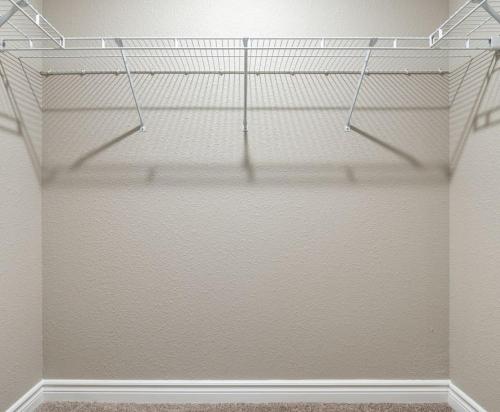 a closet with white walls and white shelves at Peaceful Modern Home near Avon in Avon