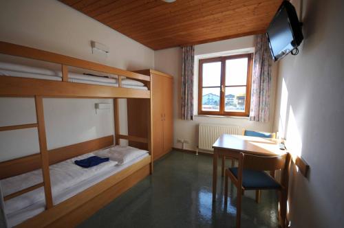 Junges Hotel Zell am Seeにあるベッド