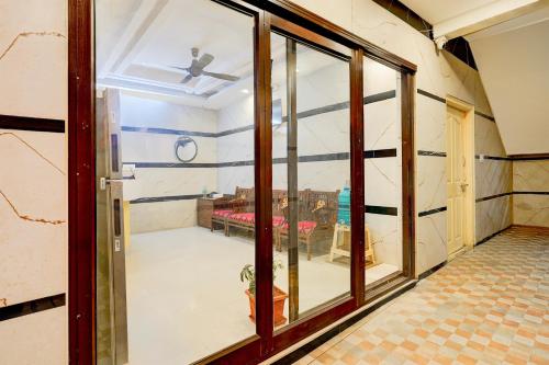 a room with a window with a view of a room at Hotel O Bluestar in Bengaluru