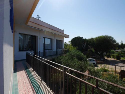 a balcony of a house with a fence at B&B Al Vecchio Pontile Sea View in Marsala