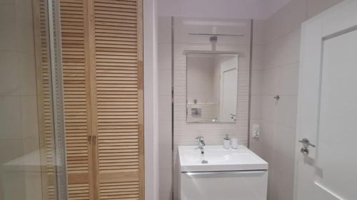 Koupelna v ubytování M&K Apartament Morska Łukęcin