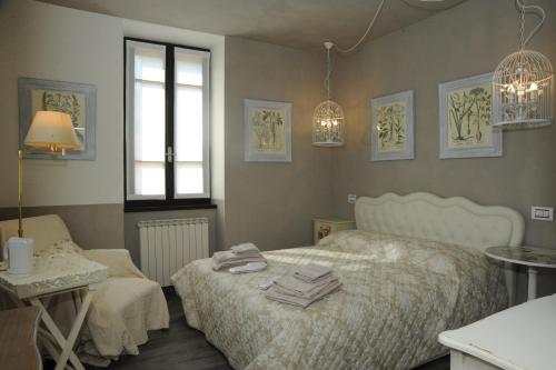 Postel nebo postele na pokoji v ubytování La Mainolda B&B