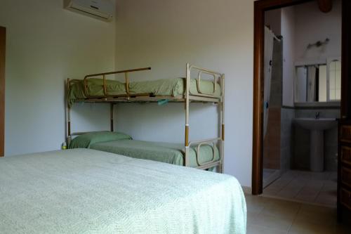 Katil atau katil-katil dalam bilik di B&B Nurachi
