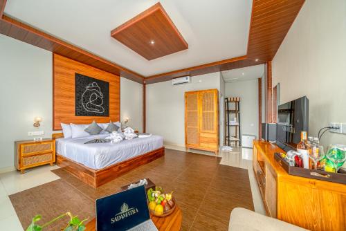 Postel nebo postele na pokoji v ubytování SADAMATRA - Luxury Infinity Views