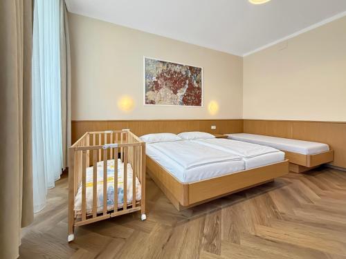 Postel nebo postele na pokoji v ubytování Hotel-Pension Fünfhaus
