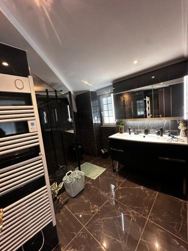 Koupelna v ubytování Chambre privée avec salle de bain