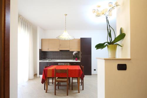 Kuchyň nebo kuchyňský kout v ubytování Residence Hotel Kriss