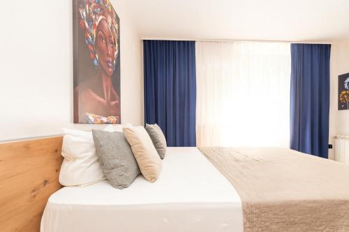 Ένα ή περισσότερα κρεβάτια σε δωμάτιο στο Central Belgrade Apartments