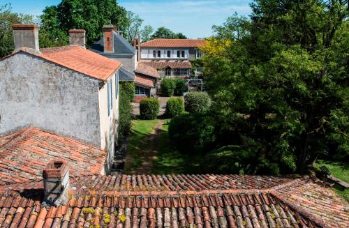an aerial view of a house with a roof at Château de l'Abbaye - Teritoria in Moreilles
