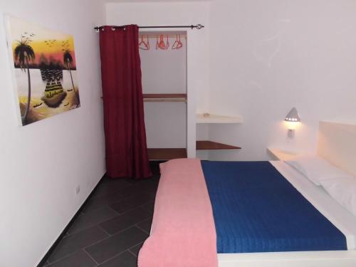 Postel nebo postele na pokoji v ubytování Cala da Lua apartments