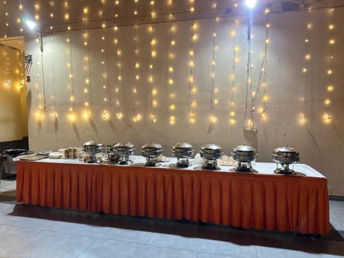 a table with drums on it with lights at Luxury 3bhk villa (mere bebe da villa)@gopal nagar in Jalandhar