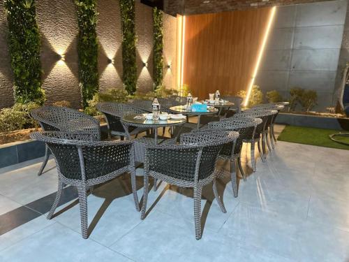 a row of tables and chairs in a restaurant at Luxury 3bhk villa (mere bebe da villa)@gopal nagar in Jalandhar