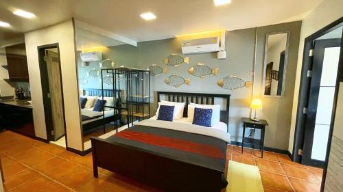 Ένα ή περισσότερα κρεβάτια σε δωμάτιο στο Beach Gallery House