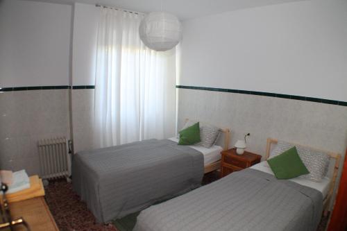 Posteľ alebo postele v izbe v ubytovaní Casa La Madriguera