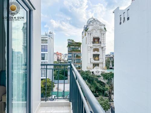 a balcony with a view of a building at Golden Sun Hotel Apartments 5 in Ho Chi Minh City