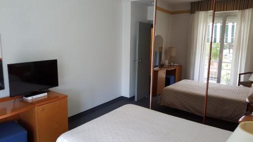Hotel Augustusにあるベッド