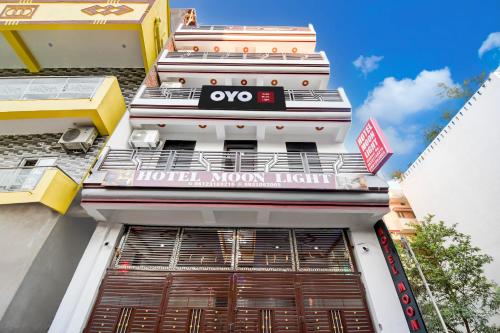 a building with a hotel moon light sign on it at Hotel O Moon Light in Patna