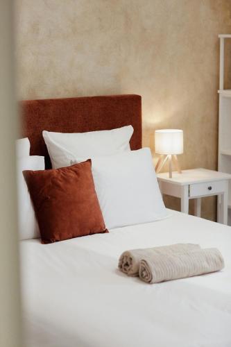 Una cama o camas en una habitación de Gîte Saint-Roch