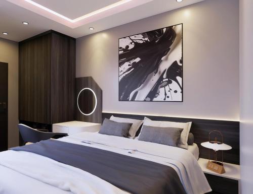 Cama o camas de una habitación en SOL Center Hotel