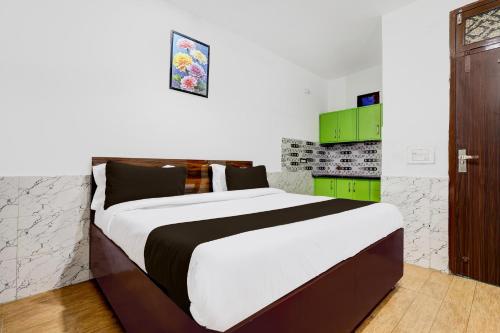 Hotel O Ekant Guest Houseにあるベッド