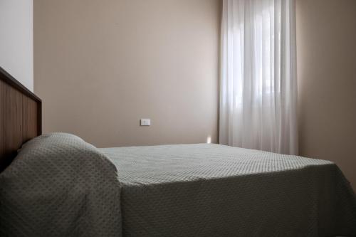 Katil atau katil-katil dalam bilik di MINA Apartments