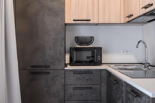 Dapur atau dapur kecil di MINA Apartments