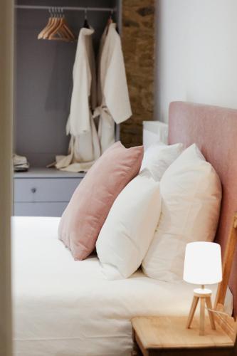 Una cama o camas en una habitación de Gîte Saint-Roch