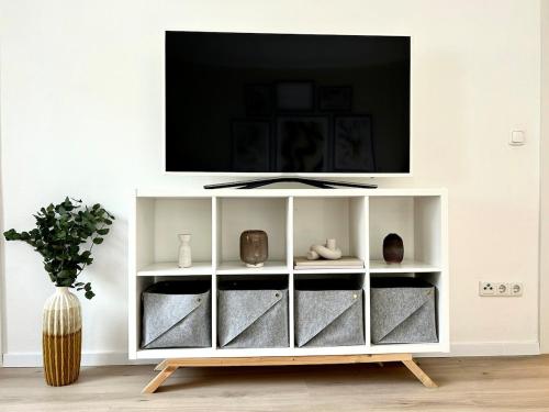 Μια τηλεόραση ή/και κέντρο ψυχαγωγίας στο Apartment Alfred
