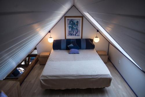 Ένα ή περισσότερα κρεβάτια σε δωμάτιο στο Det Gamle Mejeri
