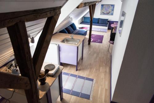 an overhead view of a tiny house with a sink at Det Gamle Mejeri in Stokkebro