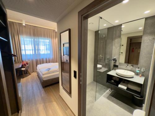 A bathroom at Hafnerhotel - Das Kachelofen-Wohlfühlhotel