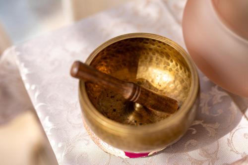 a close up of a gold tin with a spoon in it at Villa Vitali - Bellagio in Bellagio