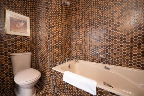 Koupelna v ubytování Irmella 39 by Arosa Vacations, mit Pool & Sauna