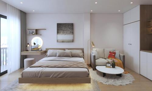 Voodi või voodid majutusasutuse Le Petit Hotel & Travel toas