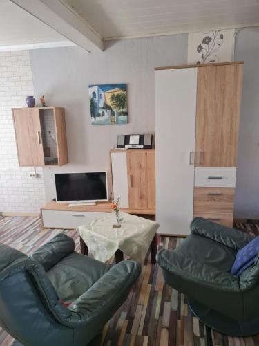 Μια τηλεόραση ή/και κέντρο ψυχαγωγίας στο Kleine Wohnung an der Werra