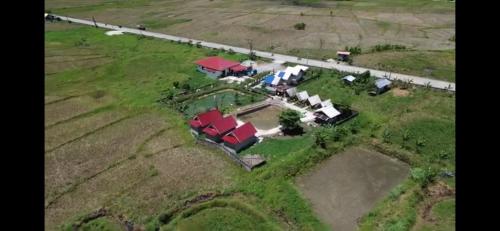 an aerial view of a house in a field at Jazz Ferme Inn Batuan Bohol in Batuan