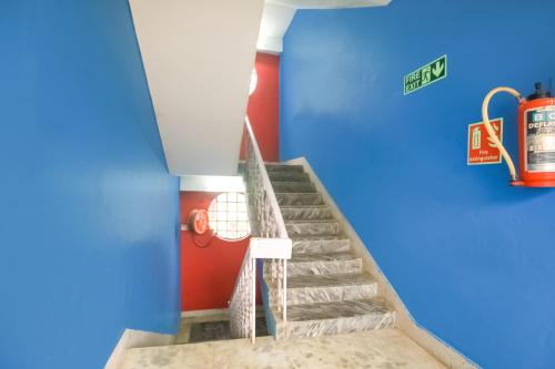 a set of stairs in a lego building at Hotel O Krishna Guest House Siliguri Railway Station in Panchanai