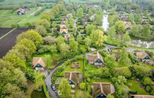 an aerial view of a residential neighborhood with houses at 3 Bedroom Cozy Home In Paasloo in Paasloo