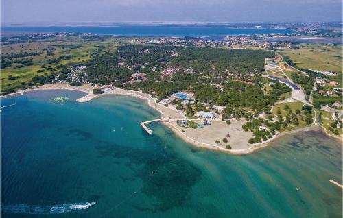 an aerial view of a small island in the water at Apartment Maslenica in Jasenice